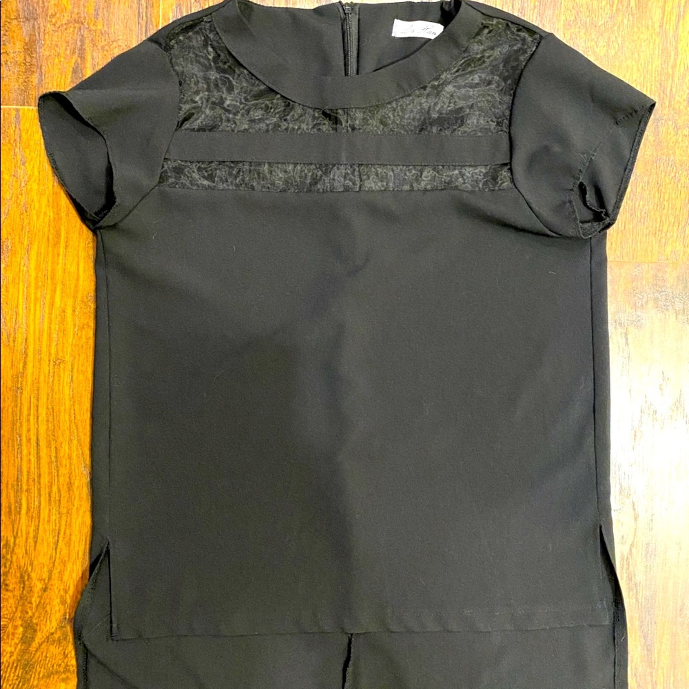 Black blouse with mesh chest cutout